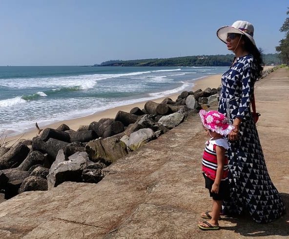 Mom and kid near Querim side of Keri beach in goa