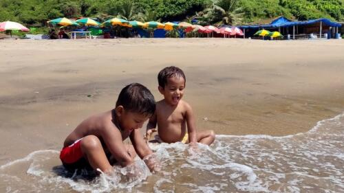 Magnificent Kalacha Beach in Goa - Delighted baby