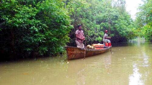 Floating coconut shop on the way to Poovar Island in Kerala