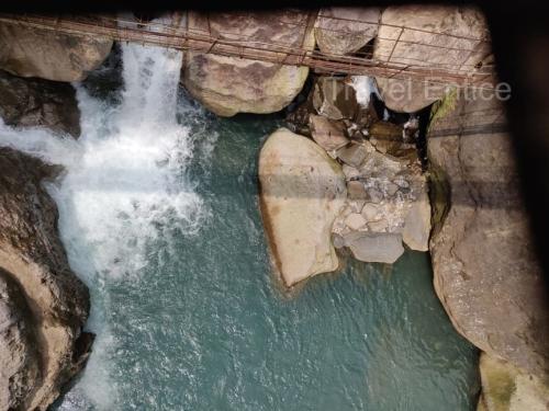 Flowing-stream-far-below-on-the-way-to-Double-Decker-Living-Root-Bridge